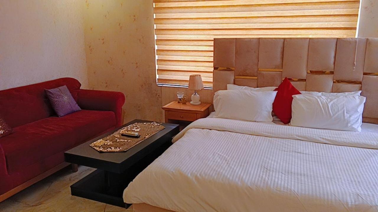 Hotel Nuit De Paris à Abuja Extérieur photo